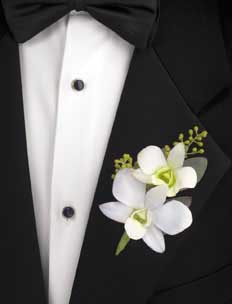 This boutonniere consists of one white dendrobium orchid and 	one stem of seeded eucalyptus.