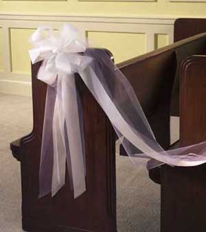 This pew bow contains satin white ribbon and white tulle.