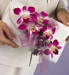 This bouquet contains Dendrobium orchids satin ribbon