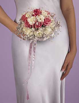 nosegay bouquet with roses, carnations, gypsophilia and 	ribbon