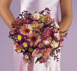 bouquet contains large cream bud roses, white satin belle 	flowers, baby's breath and cream dried statice